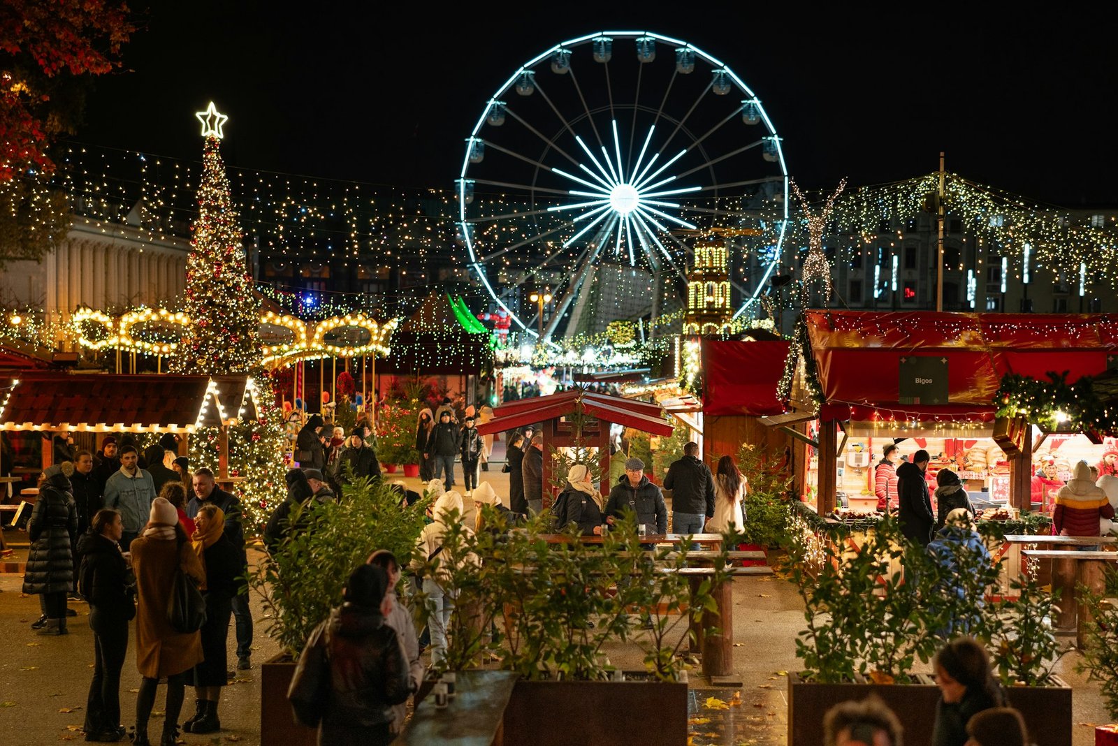 Wooden chalets and Ferris wheel at the Nice Christmas village, Place Masséna